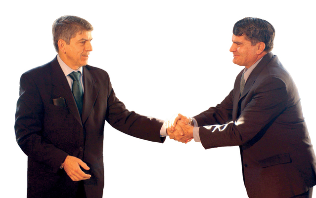 businessmen-shaking-hands-1240995-639x401